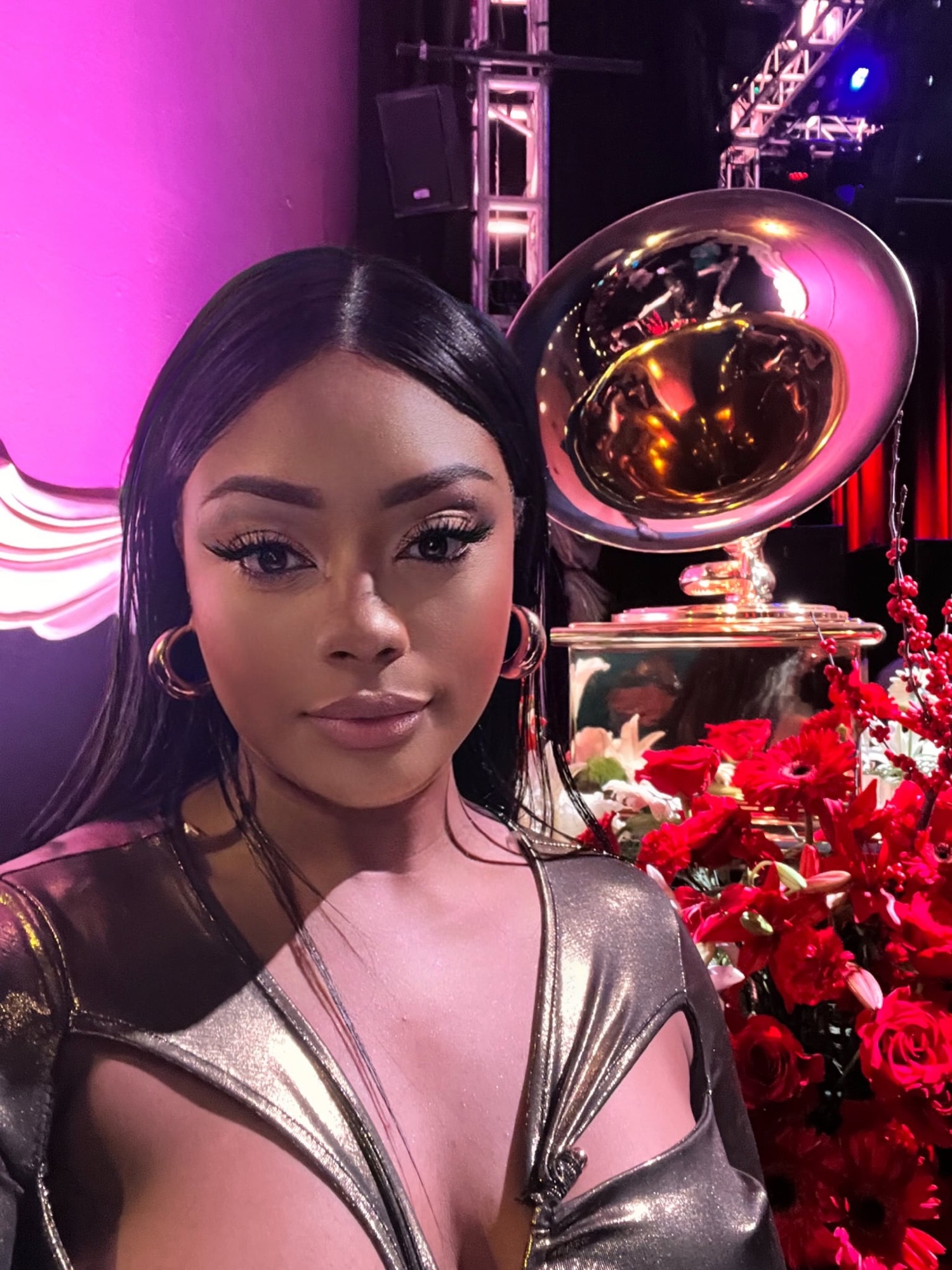 Belizean artist Micah takes a selfie with the iconic 2025 GRAMMYs golden gramophone at the Dallas Texas Chapter event recording academy