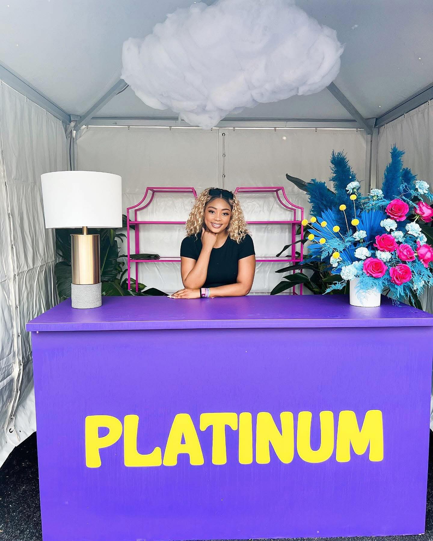 Micah sitting at the concierge desk during Sueños Chicago 2022, managing VIP guest services and supporting production at the first Latin festival in downtown Chicago.